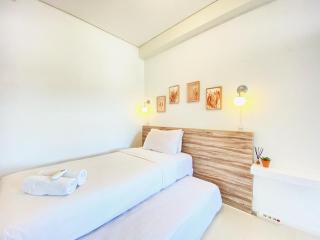 Cheerful and Homey 2BR Apartment at Parahyangan Residence By Travelio - Bandung - 9
