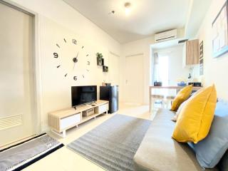 Cheerful and Homey 2BR Apartment at Parahyangan Residence By Travelio - Bandung - 2