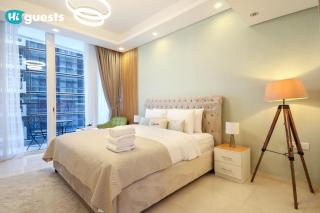 HiGuests - Stylish Urban Studio Escape in Waves Tower by KASCO - Dubái - 9