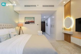 HiGuests - Stylish Urban Studio Escape in Waves Tower by KASCO - Dubái - 3