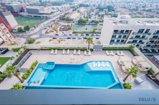 Charming 1BR Apartment in The Ivy, Jumeirah Village Triangle by Deluxe Holiday Homes - Dubai - 6