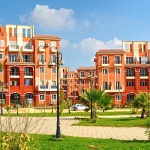 شقـة فندقيـة بحديقـة خـاصة - كـمبوند روضـة زايـد - 7