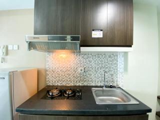 Cozy Studio at 20th Floor Grand Dhika City Apartment By Travelio - Bekasi - 2