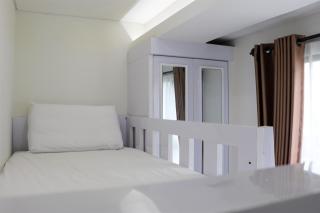 Comfort 2BR Apartment at 30th Floor Transpark Cibubur By Travelio - Depok - 4
