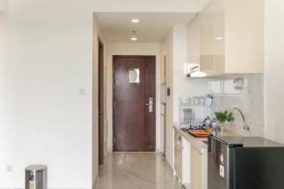 Calma 2BR II at Skyhouse Apartment - Samporo - 8