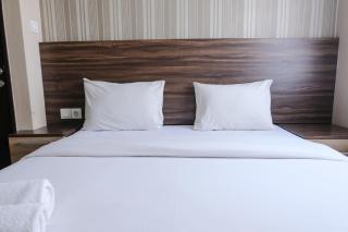 Homey and Cozy 2BR at Mekarwangi Square Cibaduyut Apartment By Travelio - Bandung - 9
