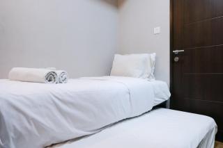 Homey and Cozy 2BR at Mekarwangi Square Cibaduyut Apartment By Travelio - Bandung - 6