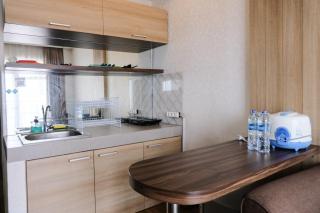 Homey and Cozy 2BR at Mekarwangi Square Cibaduyut Apartment By Travelio - Bandung - 3