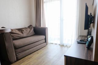 Homey and Cozy 2BR at Mekarwangi Square Cibaduyut Apartment By Travelio - Bandung - 5