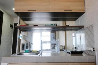 Homey and Cozy 2BR at Mekarwangi Square Cibaduyut Apartment By Travelio - 1