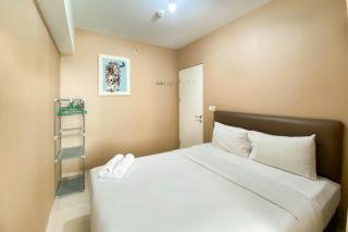 Comfort and Elegant 4BR Combined at Springlake Summarecon Bekasi Apartment By Travelio - 7