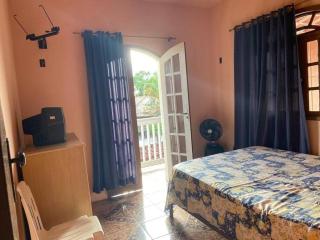 Casa, com área e churrasqueira e uma ampla garagem - 2