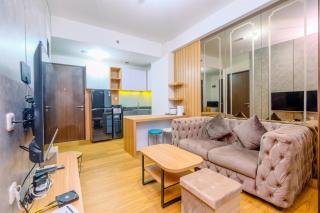 Great Location and Comfort 2BR Transpark Cibubur Apartment By Travelio - Depok - 2