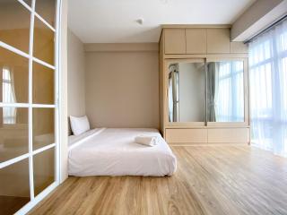 Cozy and Simple Big Studio Vasanta Innopark Apartment By Travelio - Bekasi - 8