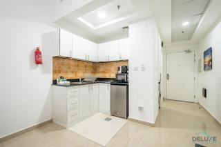 Charming Studio in Hanover Square, Jumeirah Village Circle by Deluxe Holiday Homes - Dubai - 6