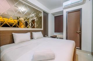 Warm and Minimalist Studio Room Transpark Cibubur Apartment By Travelio - Depok - 0