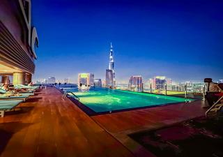 Luxury 2BR at Paramount Midtown with infinity pool - Dubai - 9
