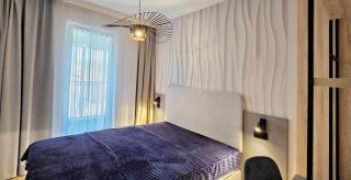 HOLIDAY HOME Baltic Waves B207 z osobną sypialnią i balkonem, GRATIS basen, sauna, gym - Misdroy - 1