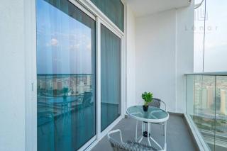 Elegant 1BR with Outdoor Cinema & Clinic - Dubai - 6