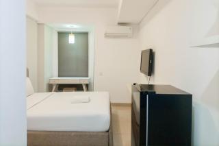 Cozy Studio at Barsa City Apartment By Travelio - Seturan - 9