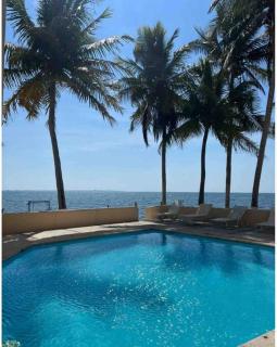 Escape to Serenity by the Sea! Beachfront Apartment with Pool, Just 5 Minutes from the Ferry - Cancún - 9