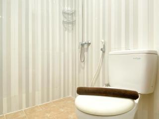 Homey and Compact Studio at Azalea Suites Apartment By Travelio - Cikarang - 5