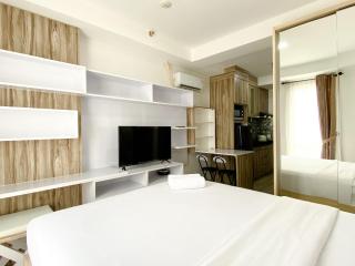 Homey and Compact Studio at Azalea Suites Apartment By Travelio - Cikarang - 8