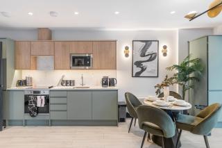 Unwind in Style 2BR with Cozy Backyard for Groups - 9