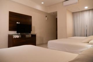 Infinity Suites triple room 206 - Cancún - 3