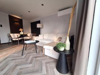 'Relax Lodge Sea' - Wellness lodge in Zeeland - Private Sauna - Airco - Garden - Outdoor Swimming pool - Free Wifi, Towels & Bed linen - 1