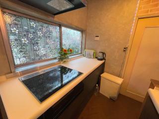 Tatami room & Living Room equipped with Multinational TV and Fire, BBQ corner in Tokyo Downtown House - 2