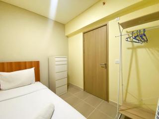 Modern 2BR at Meikarta Apartment By Travelio - Cikarang - 5