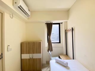 Homey and Minimalist 2BR at Meikarta Apartment By Travelio - Cikarang - 7