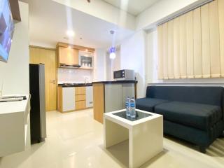 Comfortable 2BR at 25th Floor Meikarta Apartment By Travelio - Cikarang - 7