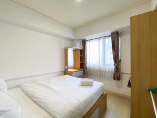 Comfortable 2BR at 25th Floor Meikarta Apartment By Travelio - Cikarang - 9