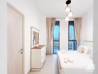 Luxurious 1BR Apt with Balcony in Production City - Dubai - 2