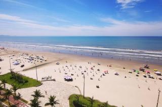 Pé na praia, em frente ao mar, Praia Grande - 0