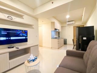 Serene Designed 2BR at Meikarta Apartment By Travelio - 1