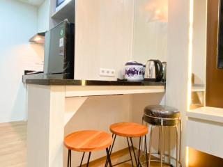 Cozy and Homey Studio at Vasanta Innopark Apartment By Travelio - Cikarang - 4