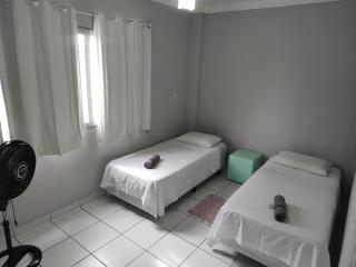 Ed Bertholi - Vista lateral do mar com garagem - 7