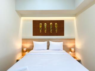 Stunning and Homey 2BR Apartment Mustika Golf Residence By Travelio - Cikarang - 0