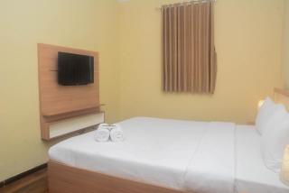 Elegant and Nice 2BR at Grand Palace Kemayoran Apartment By Travelio - Giacarta - 8