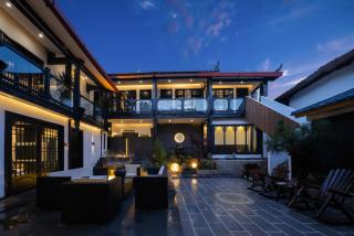 Yunman Sky Cloud Quiet Garden Guesthouse offers breakfast and afternoon tea with free airport shuttle servicesThe hotel provides paid car service ticket services for attractions features billiards room KTV tea room saunas laundry facilities café meeting - 9