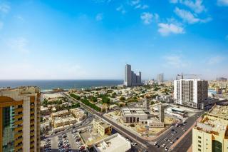 Sleek nordic style seaview condo - Ajman - 2