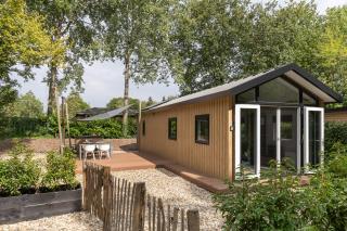 Schitterend 4 persoons Tinyhouse met HOTTUB aan de bossen in Putten 4-16 - 0