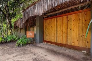 Casa Caqui Trancoso - Cravejada em reserva natural - 9