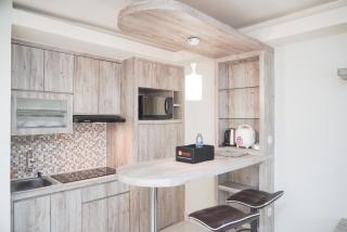 Comfort and Minimalist Studio at Amethyst Apartment By Travelio - 3