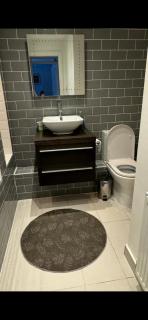 Riverside Retreat with Balcony, Workspace & Parking - 5