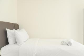 Minimalist and Homey Studio Green Bay Pluit Apartment By Travelio - 6