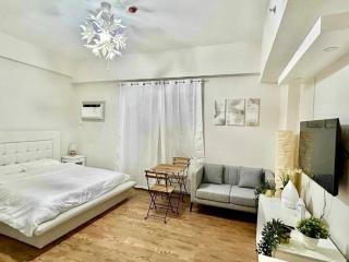 Cozy and Sunny Apartment near to Mactan Cebu International Airport - Amani Grand Resort & Residences - Pusok - 5